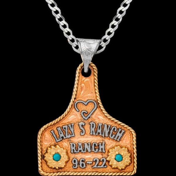 Penny, Copper base measures 1.75"x1.50", Jewelers Bronze rope edge and flowers with Cubic Zirconia of your choice. German Silver letters.

Chain 